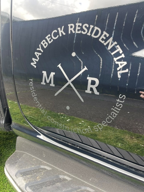 Custom service vehicle graphics by Refined NZ, featuring branded design and contact information on a commercial vehicle