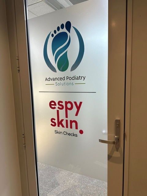 Privacy-enhancing window frosting with modern geometric pattern, installed on service premises by Refined NZ.